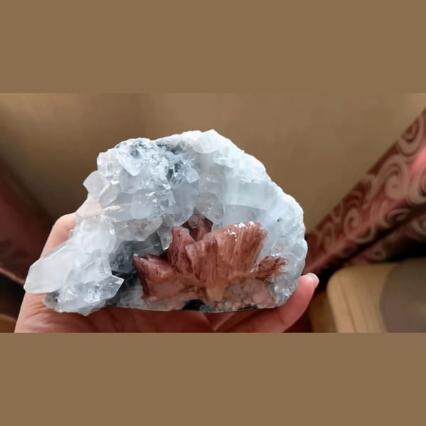 Clear apophyllite with peach red stilbite from India — complete view