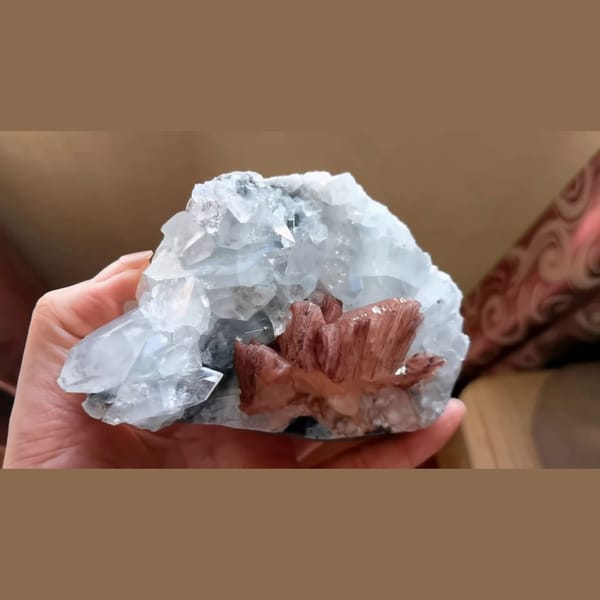 Clear apophyllite with peach red stilbite from India — alternate view