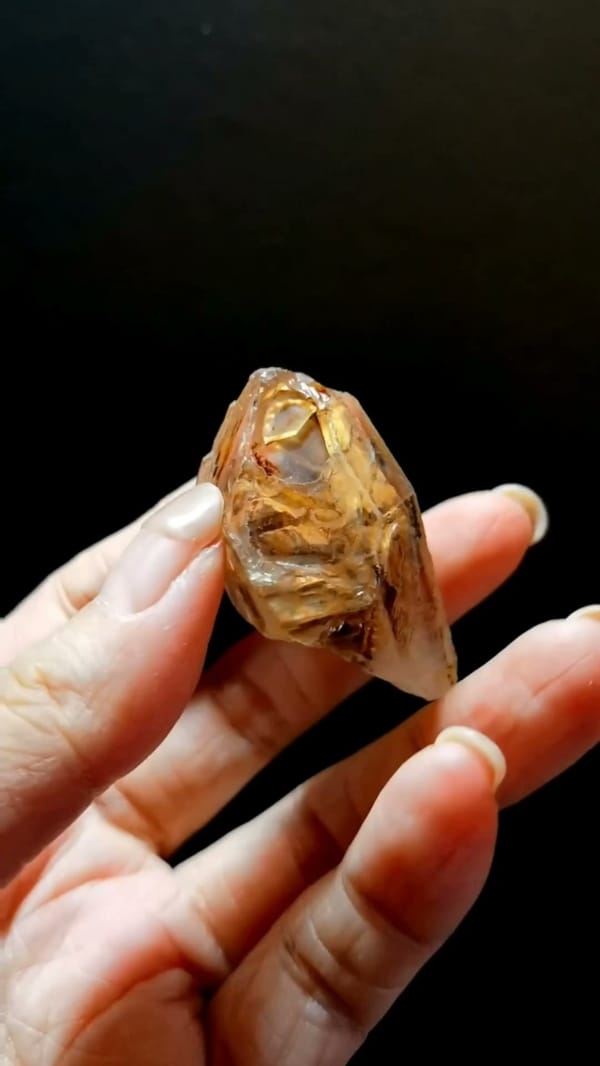 Complete front view of Red-Earth Deep-Window Skeletal Quartz from Madagascar