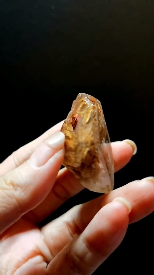 Complete side view of the exact Red-Earth Deep-Window Skeletal Quartz from Madagascar