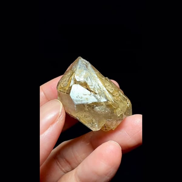 Yellow clay skeletal quartz point from Pakistan — alternate view