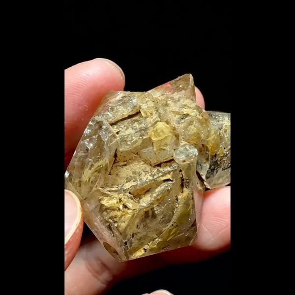 Yellow clay skeletal quartz point from Pakistan — alternate view