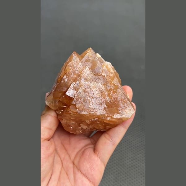Large 7 cm orange scheelite crystal from Xuebaoding, Sichuan — complete view