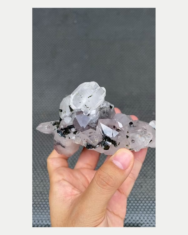 Complete left oblique view of garden quartz crystal cluster