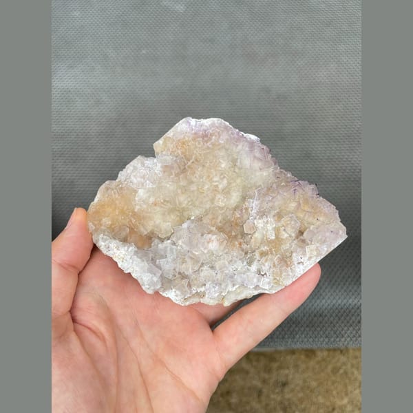Pale translucent fluorite plate from Guizhou — complete view