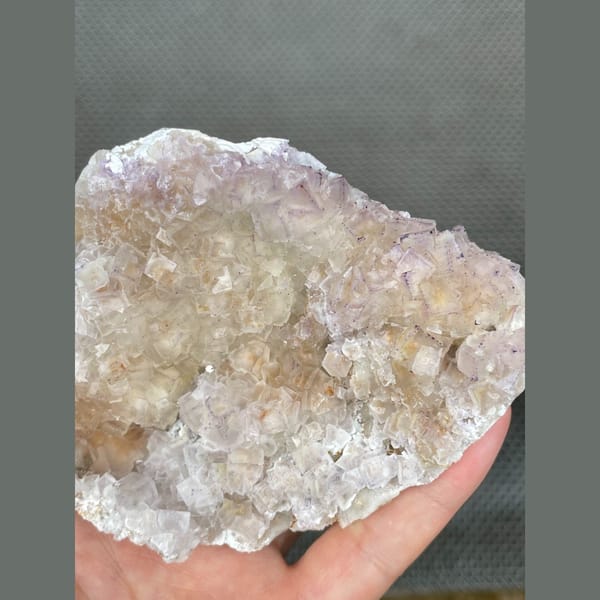 Pale translucent fluorite plate from Guizhou — alternate view