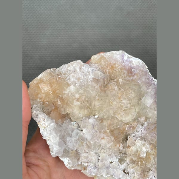 Pale translucent fluorite plate from Guizhou — detail view