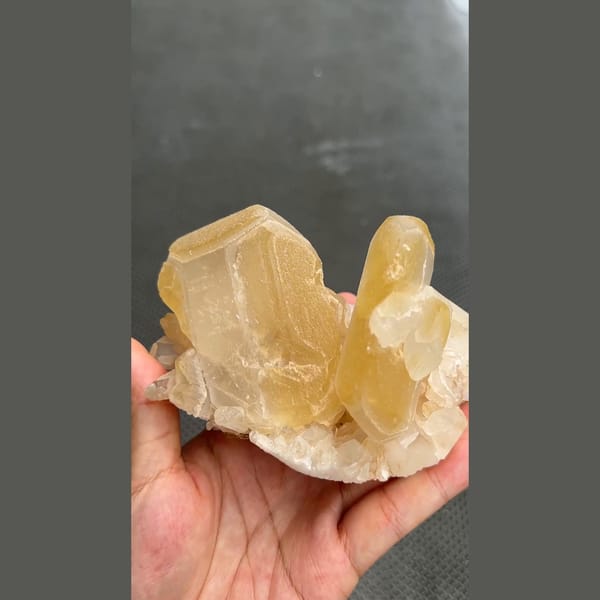 Large honey-cream barite crystal cluster from Jinkouhe, Sichuan — alternate view