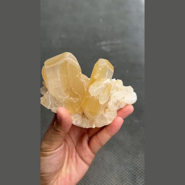 Large honey-cream barite crystal cluster from Jinkouhe, Sichuan — alternate view