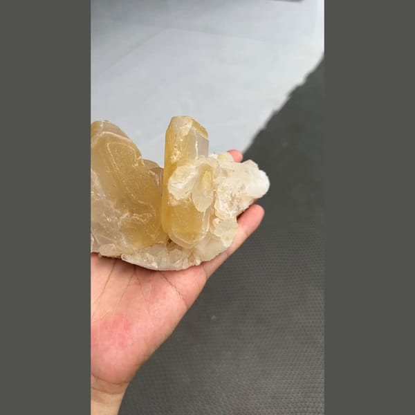 Large honey-cream barite crystal cluster from Jinkouhe, Sichuan — detail view