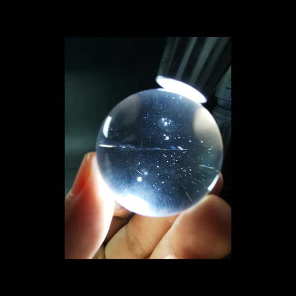 Near-Clean clear quartz sphere, 34.8 mm — detail view