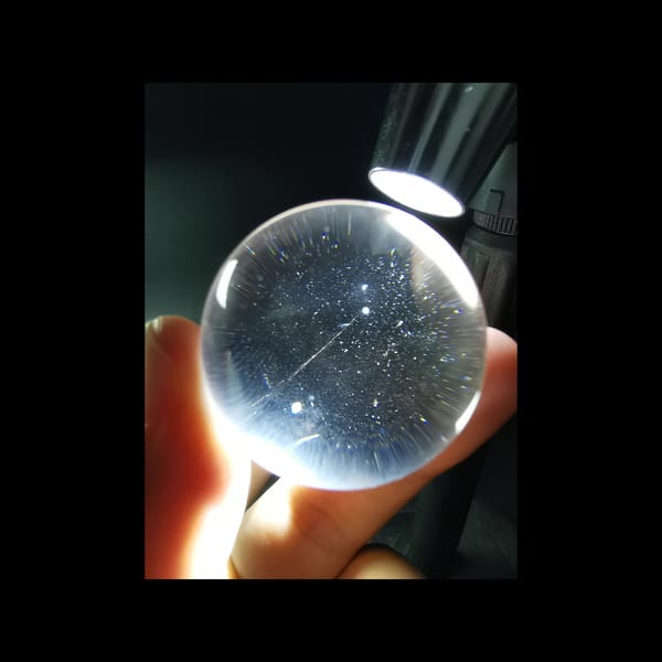 Near-Clean clear quartz sphere, 34.8 mm — detail view