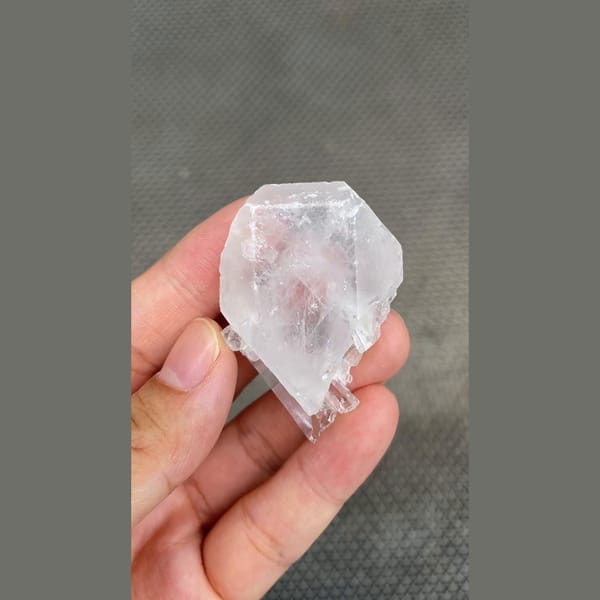 Clear glassy barite crystal with quartz from Jinkouhe, Sichuan — alternate view
