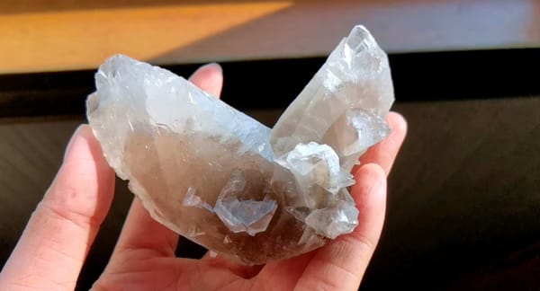 Complete front view of Twinned Swallowtail Calcite from Daye