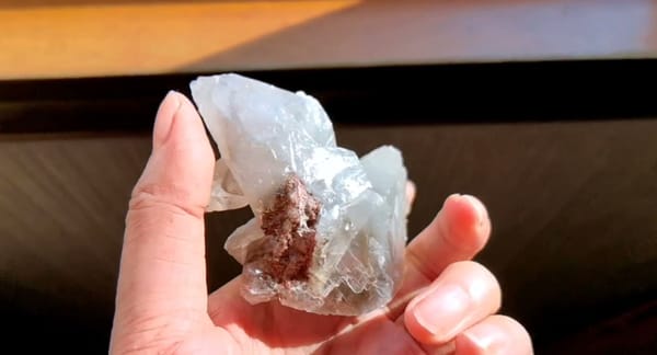 Complete reverse view of the exact Twinned Swallowtail Calcite from Daye