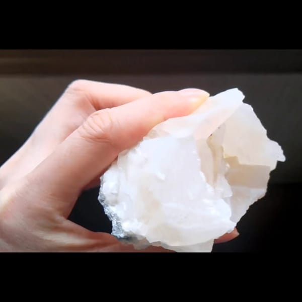 Pale pink rose petal calcite from Hunan — complete view