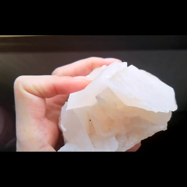 Pale pink rose petal calcite from Hunan — alternate view