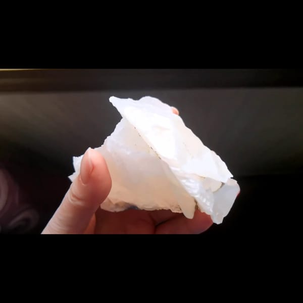 Pale pink rose petal calcite from Hunan — alternate view