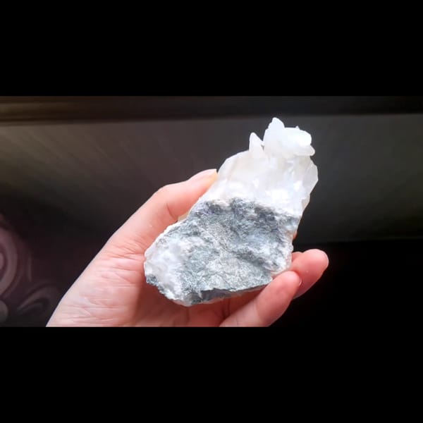 Pale pink rose petal calcite from Hunan — detail view