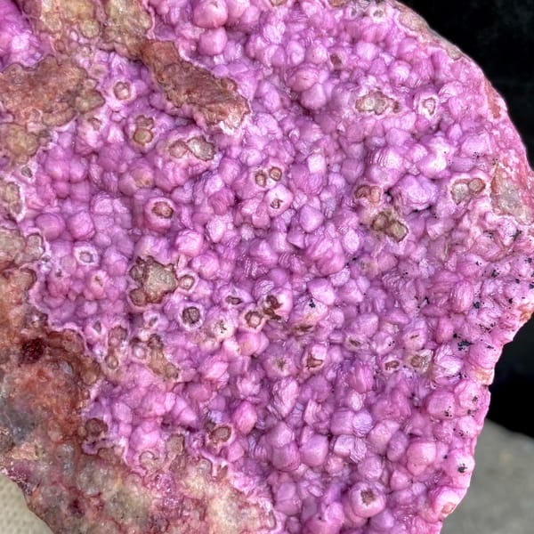 Vivid hot pink cobaltoan calcite plate — detail view