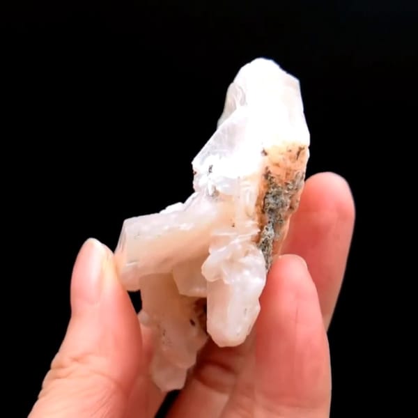 Pink zeolite cluster from India — alternate view
