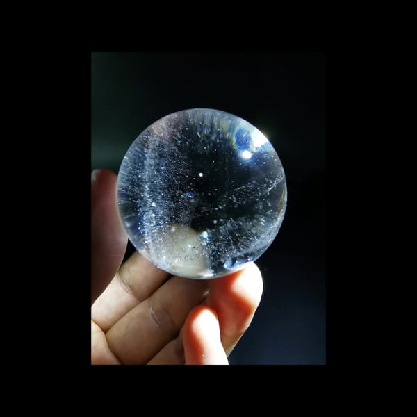 Starry clear quartz sphere, 43.5 mm — detail view