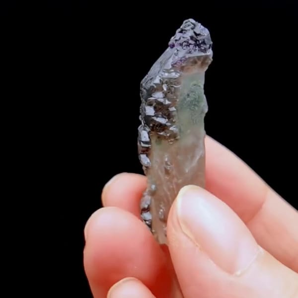 Interference quartz with chlorite and purple fluorite — detail view