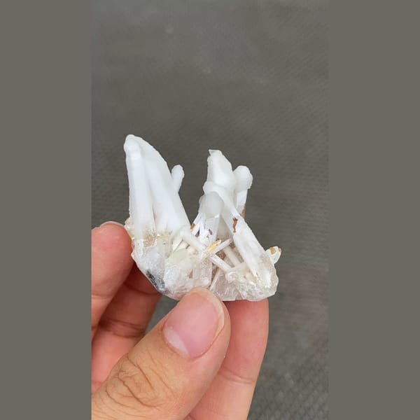 White quartz cluster with dolomite and calcite from Jinkouhe, Sichuan — alternate view
