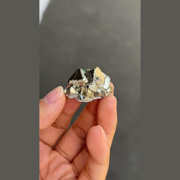 Bright brassy pyrite cluster from Peru — detail view