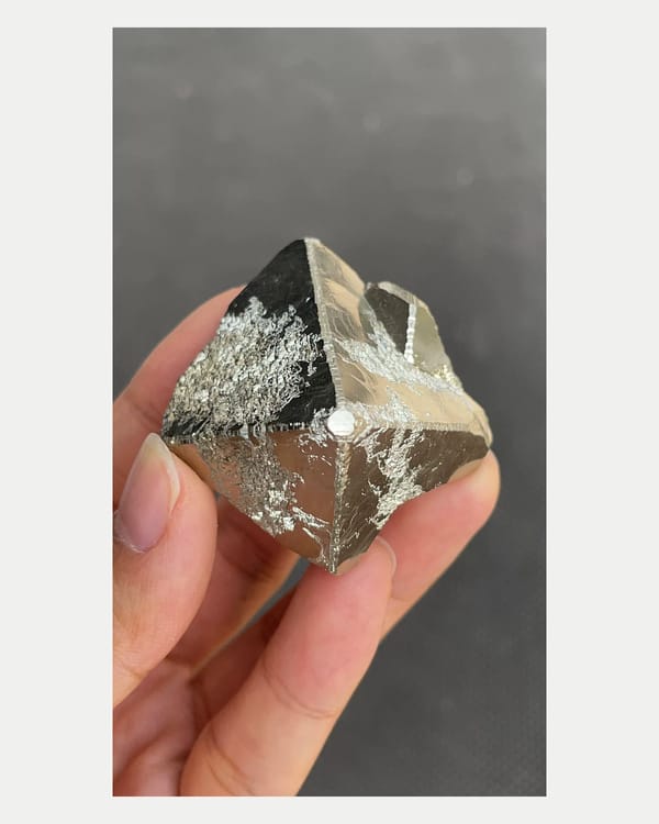 Complete low oblique view showing reflective pyrite edges