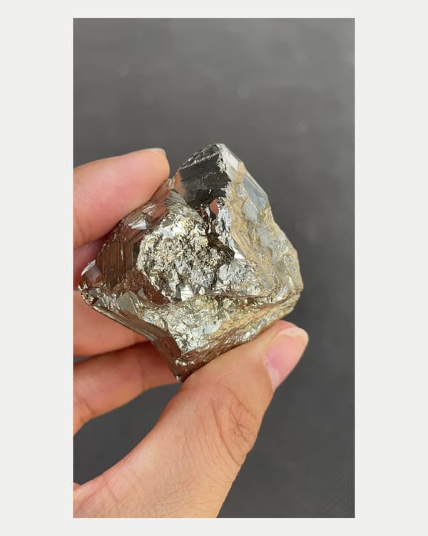 Complete underside view showing natural rough pyrite growth