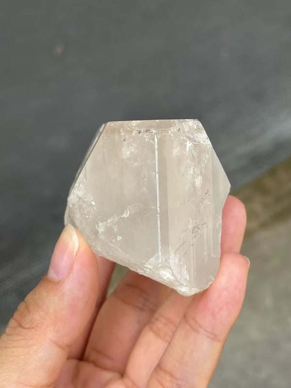 Translucent Gray Topaz Crystal — Pakistan — individual mineral specimen view 3