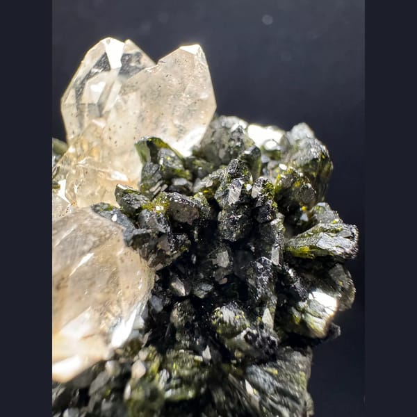 Ball-shaped quartz cluster with green epidote from Turkey — detail view