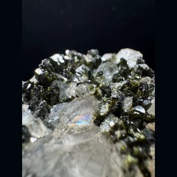 Ball-shaped quartz cluster with green epidote from Turkey — detail view