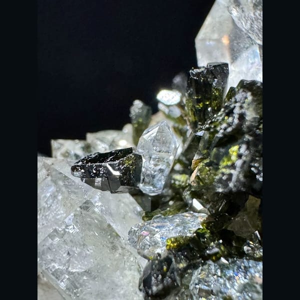 Ball-shaped quartz cluster with green epidote from Turkey — detail view