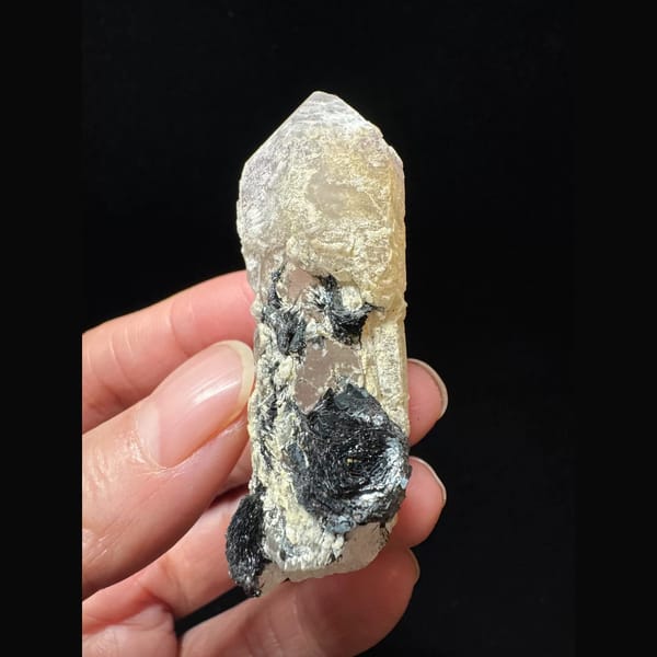 Pale amethyst with an open specular hematite rosette from Inner Mongolia — complete view