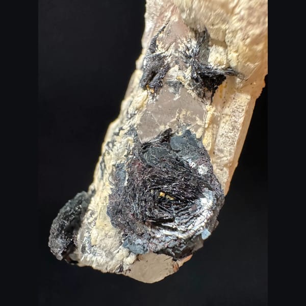 Pale amethyst with an open specular hematite rosette from Inner Mongolia — alternate view