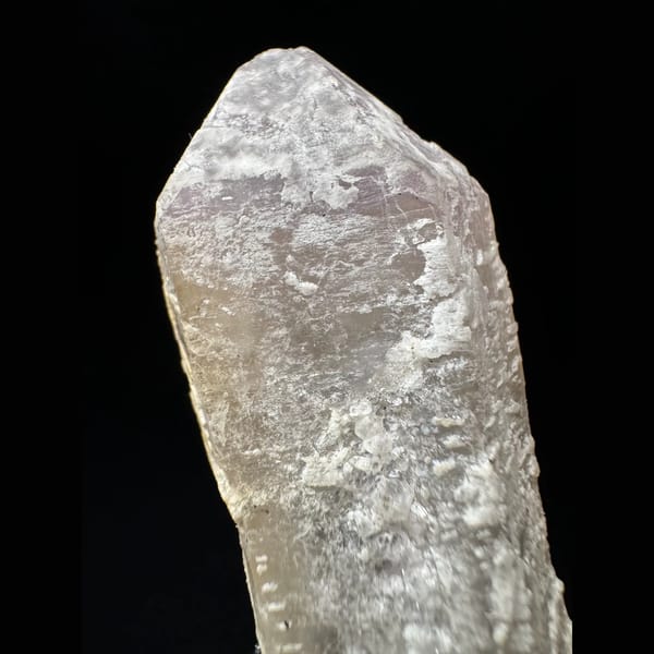 Pale amethyst with an open specular hematite rosette from Inner Mongolia — detail view