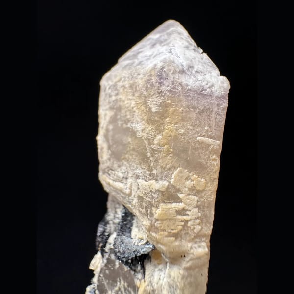Pale amethyst with an open specular hematite rosette from Inner Mongolia — detail view