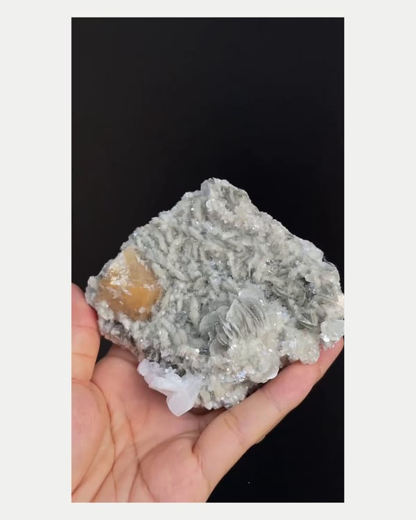 Complete reverse view of scheelite on mica and feldspar