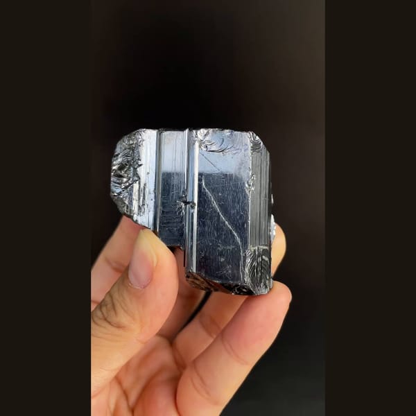 Large lustrous steel-grey bournonite cogwheel crystals from Yaogangxian — complete view
