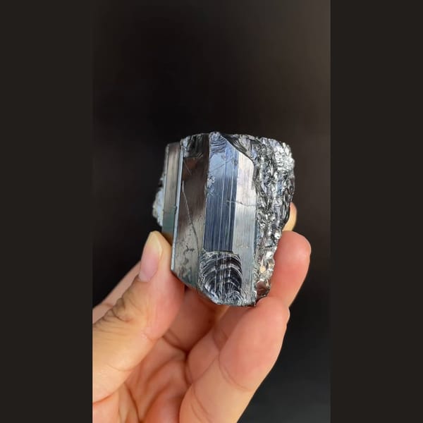 Large lustrous steel-grey bournonite cogwheel crystals from Yaogangxian — alternate view