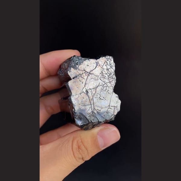 Large lustrous steel-grey bournonite cogwheel crystals from Yaogangxian — alternate view