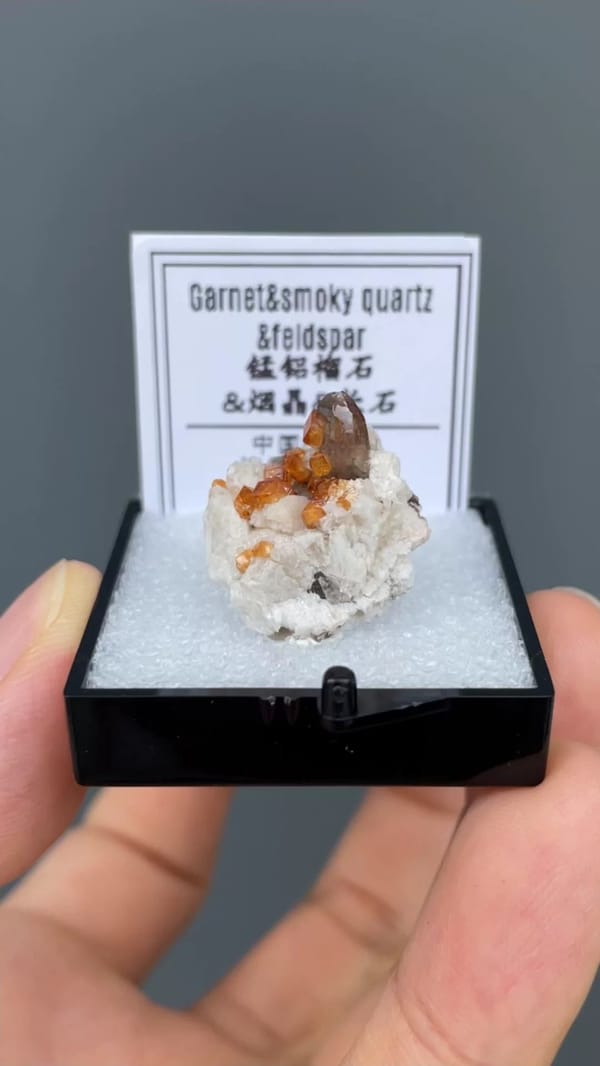 Orange Spessartine Garnet with Smoky Quartz and Feldspar — Yunxiao, Zhangzhou, Fujian, China, natural mineral specimen, photo 1 of 1