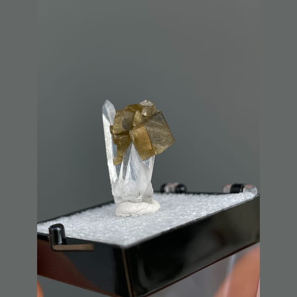 Clear quartz crystals with brown siderite from Bolivia — complete view