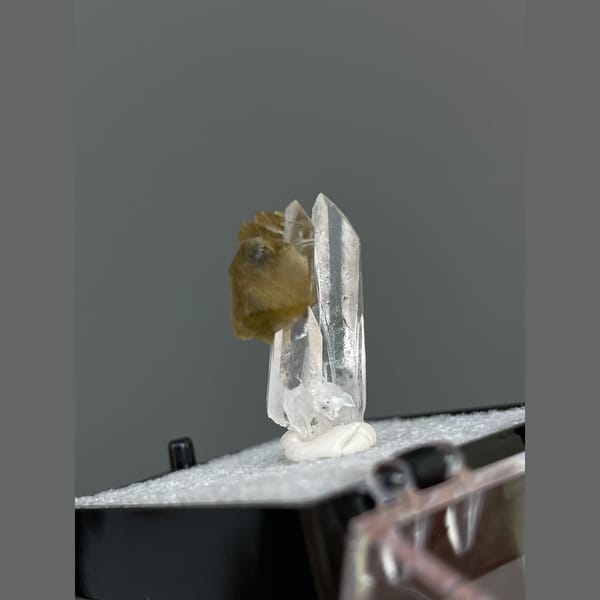 Clear quartz crystals with brown siderite from Bolivia — alternate view