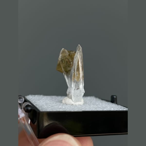 Clear quartz crystals with brown siderite from Bolivia — alternate view