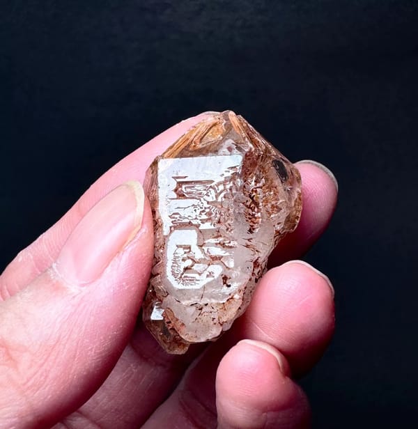 Stepped Red-Clay Skeletal Quartz Crystal — Madagascar — individual mineral specimen view 4