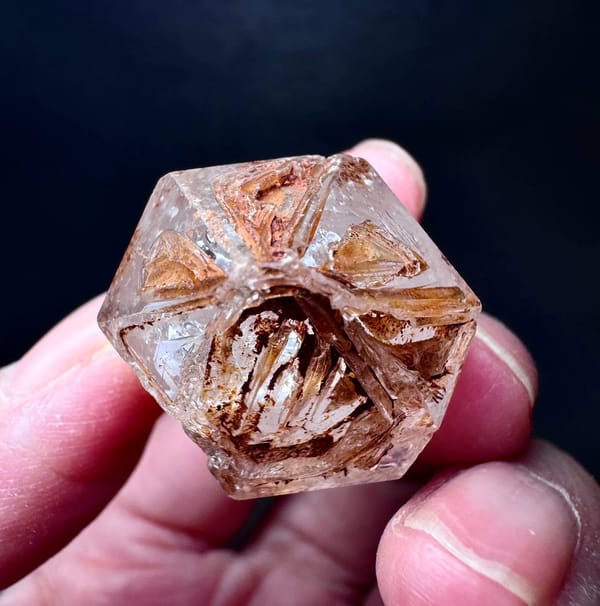 Stepped Red-Clay Skeletal Quartz Crystal — Madagascar — individual mineral specimen view 5