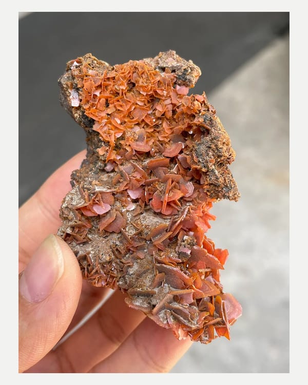 Complete alternate front view of the orange wulfenite specimen
